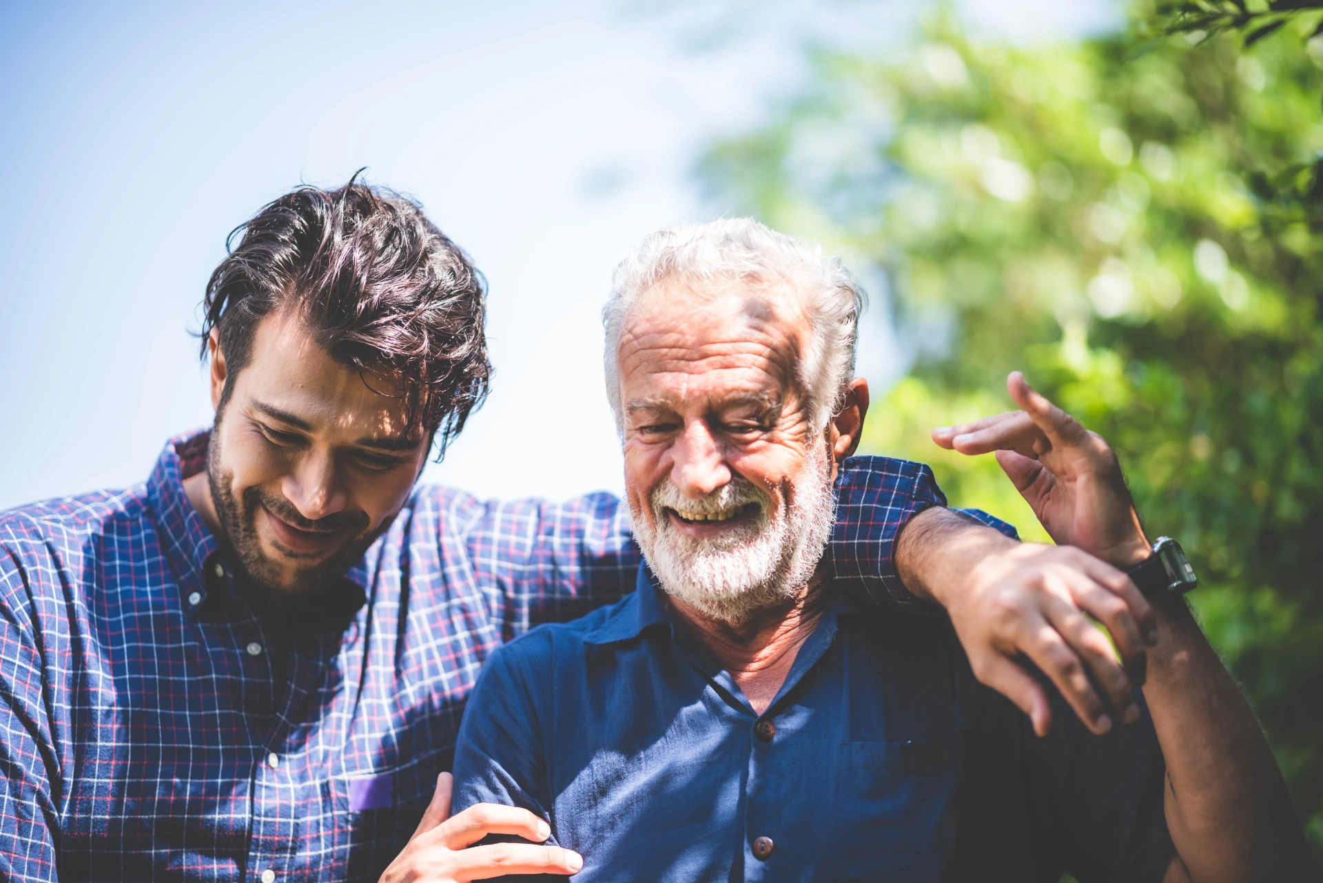 smiling-man-with-older-man-enjoying-outdoors
